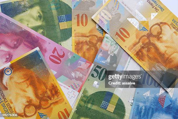 notes of swiss francs currency - f stock pictures, royalty-free photos & images