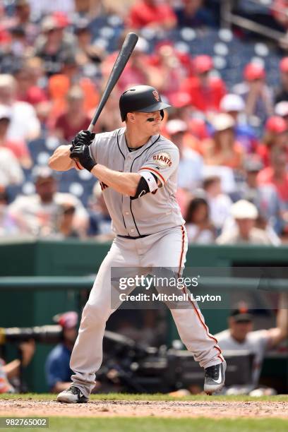 Nick Hundley of the San Francisco Giants prepares for a pitch during a baseball game against the Washington Nationals at Nationals Park on June 20,...