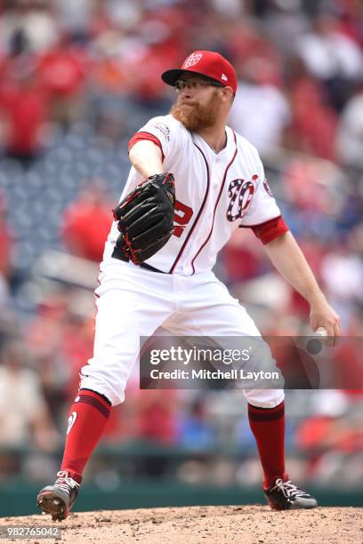 Sean Doolittle of the Washington Nationals pitches during a baseball game against the San Francisco Giants at Nationals Park on June 20, 2018 in...
