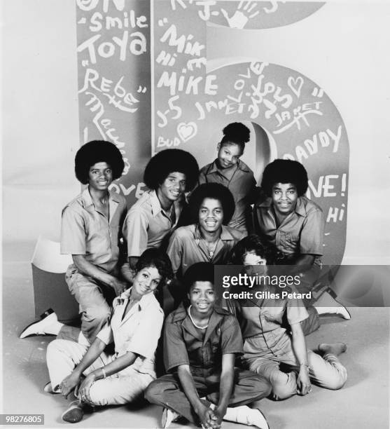 The Jacksons, including Michael Jackson, pose for a family studio group portrait in 1976 in the United States.