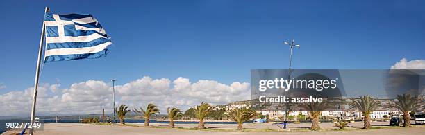 panoramic view with greek flag and cityscape of pylos - messenia stockfoto's en -beelden