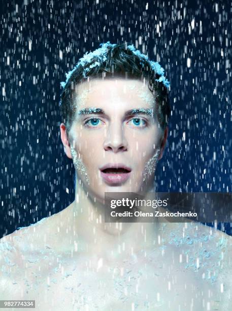 young frozen snowed man - snowed in stock pictures, royalty-free photos & images