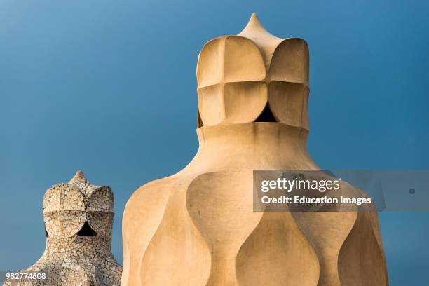 Barcelona, Guadi's The Pedrera chimneys on roof, Catalonia, Spain.