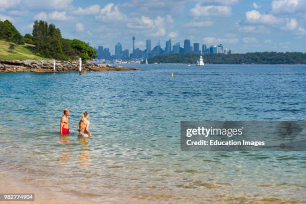 Sydney city skyline seen from Watson Bay, New South Wales, Australia.