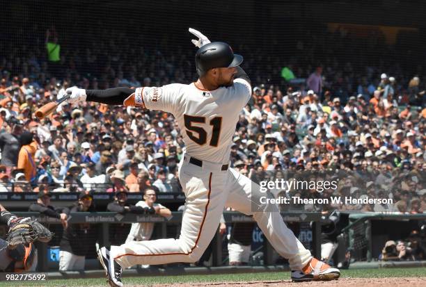 Mac Williamson of the San Francisco Giants bats against the Miami Marlins in the bottom of the six inning at AT&T Park on June 20, 2018 in San...