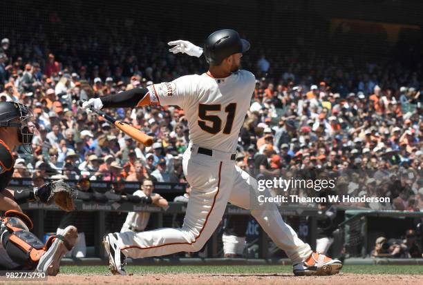 Mac Williamson of the San Francisco Giants bats against the Miami Marlins in the bottom of the six inning at AT&T Park on June 20, 2018 in San...