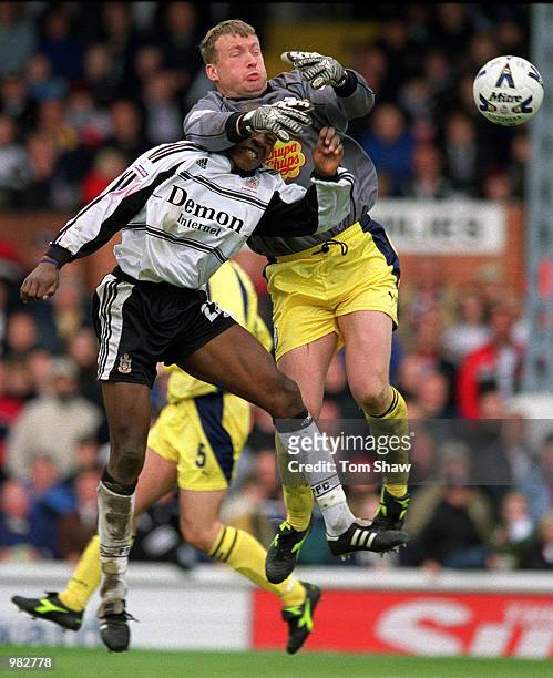 Luis Boa Morte of Fulham clashes with Kevin Pressman of Sheffield during the Fulham v Sheffield Wednesday Nationwide First Division match played at...