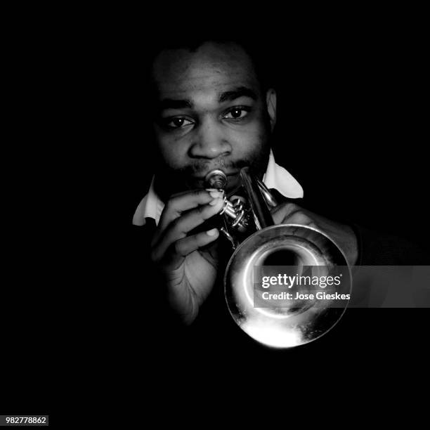 portrait of man plying on trumpet - plying stock pictures, royalty-free photos & images