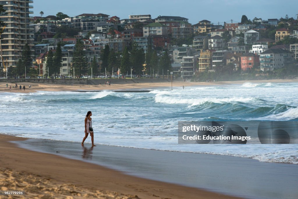 Manly beach in atmospheric evening light, Northern suburbs, Sydney, NSW, Australia.