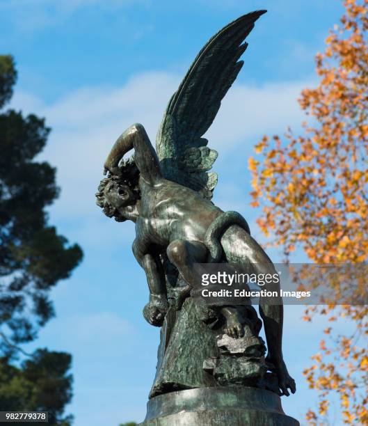 Madrid, Spain. Parque del Retiro . Statue: Monumento al Angel Caido, the Fallen Angel. .