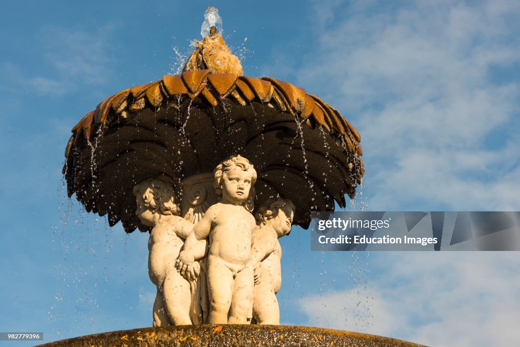 Cherubs on the Artichoke Fountain, in Retiro Park, Madrid, Spain.