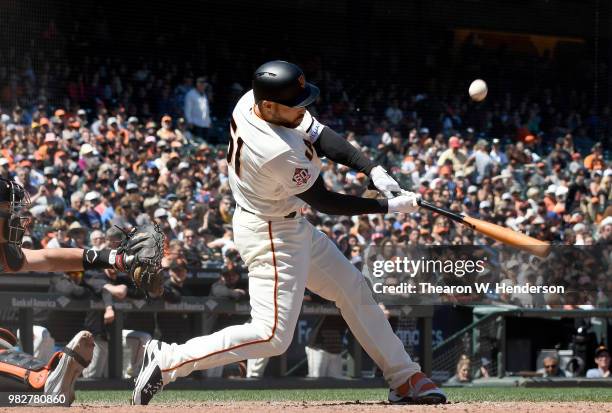 Mac Williamson of the San Francisco Giants bats against the Miami Marlins in the bottom of the eighth inning at AT&T Park on June 20, 2018 in San...