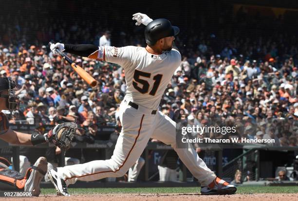 Mac Williamson of the San Francisco Giants bats against the Miami Marlins in the bottom of the eighth inning at AT&T Park on June 20, 2018 in San...