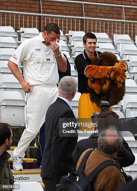 Durham bowler Stephen Harmison arrives late for the team picture during the Durham CCC photocall at the Riverside on April 6, 2010 in...