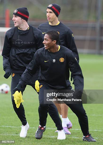 John O'Shea, Antonio Valencia and Gabriel Obertan of Manchester United in action during a First Team Training Session at Carrington Training Ground...