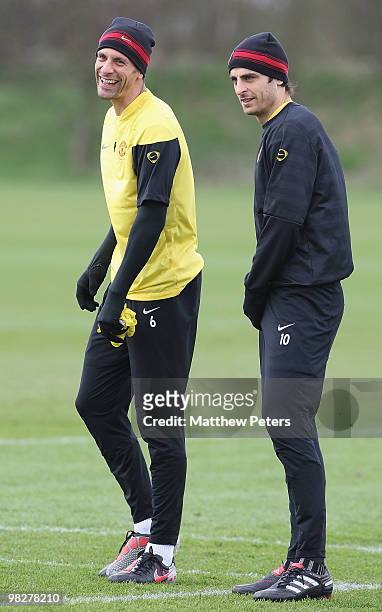 Rio Ferdinand and Dimitar Berbatov of Manchester United in action during a First Team Training Session at Carrington Training Ground on April 6 2010,...