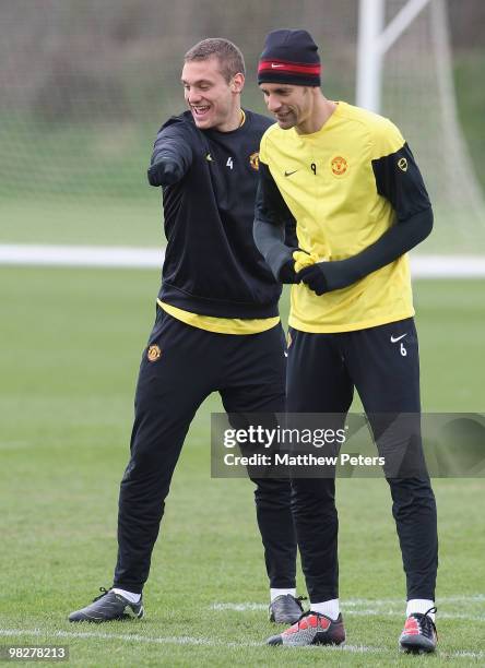 Rio Ferdinand and Nemanja Vidic of Manchester United in action during a First Team Training Session at Carrington Training Ground on April 6 2010, in...