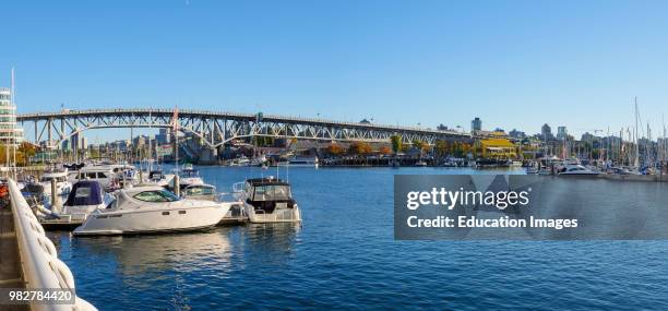 View of boats and marinas in False Creek with Granville Bridge in the background. Vancouver. British Columbia. Canada.