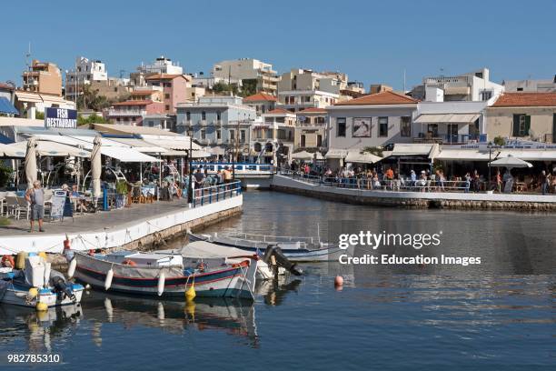 Agios Nicolaos, Crete, Greece. Boats and eating places on the Inner Lagoon.