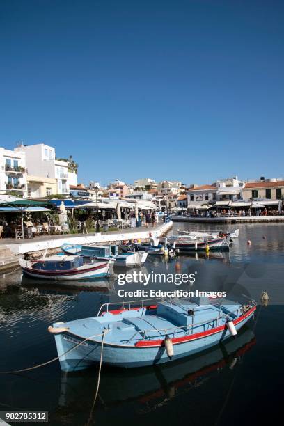 Agios Nicolaos, Crete, Greece. Boats and eating places on the Inner Lagoon.