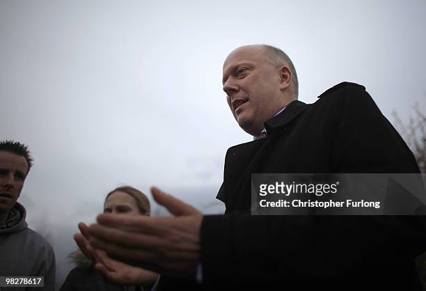 Conservative Shadow Home Secretary Chris Grayling tours a housing estate which is plagued by anti-social behaviour on April 6, 2010 in Sefton,...