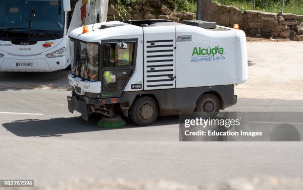 Alcudia, Mallorca, Spain, Mechanical street sweeper at work.