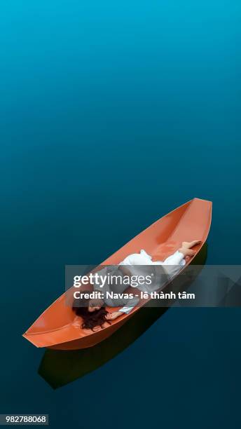 woman lying in boat, bien hoa, vietnam - bien hoa 個照片及圖片檔