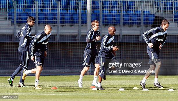 Real Madrid players Raul Albiol, Karim Benzema, Rafael Van der Vaart, Lassana Diarra and Christoph Metzelder in action during a training session at...