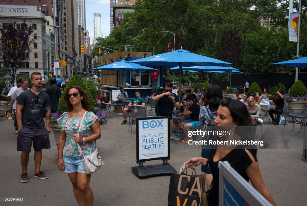 Residents And Tourists In New York City's Madison Square