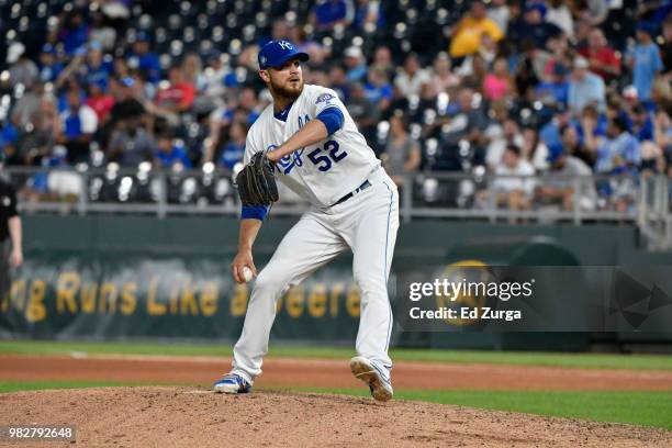 Justin Grimm of the Kansas City Royals throws against the Texas Rangers at Kauffman Stadium on June 20, 2018 in Kansas City, Missouri.