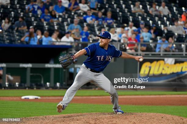 Jake Diekman of the Texas Rangers throws against the Kansas City Royals at Kauffman Stadium on June 20, 2018 in Kansas City, Missouri.