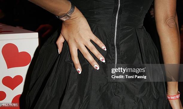 Hand of Verona Pooth with nails branded with heards at the 'Ein Herz fuer Kinder' Gala at Studio 20 at Adlershof on December 12, 2009 in Berlin,...