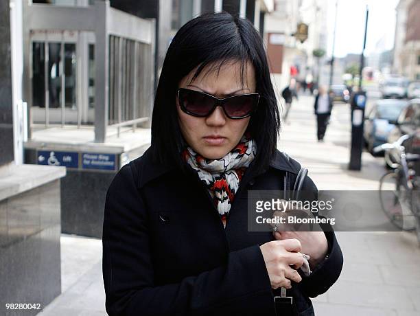 Angie Littlewood, the wife of Christian Littlewood, leaves Westminster magistrate court in London, U.K., on Tuesday, April 6, 2010. Christian...