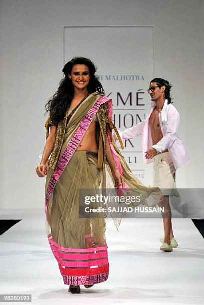 Models showcase creations by Indian designer Manish Malhotra on the second day of Lakme Fashion Week Summer/Resort 2010 in Mumbai on March 6, 2010....