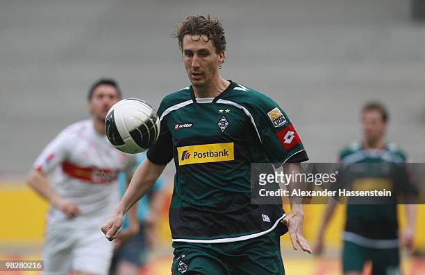 Roel Brouwers of Gladbach runs with the ball during the Bundesliga match between VfB Stuttgart and Borussia Moenchengladbach at Mercedes-Benz Arena...