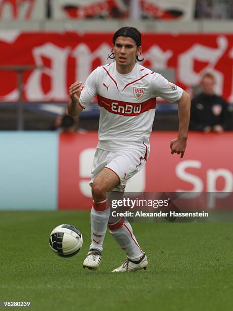 Serdar Tasci of Stuttgart runs with the ball during the Bundesliga match between VfB Stuttgart and Borussia Moenchengladbach at Mercedes-Benz Arena...