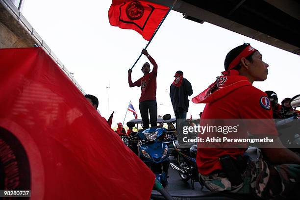 Thousands of Red shirt supporters of former PM Thaksin Shinawatra defy the government for a fourth day by taking over the streets of the city's main...