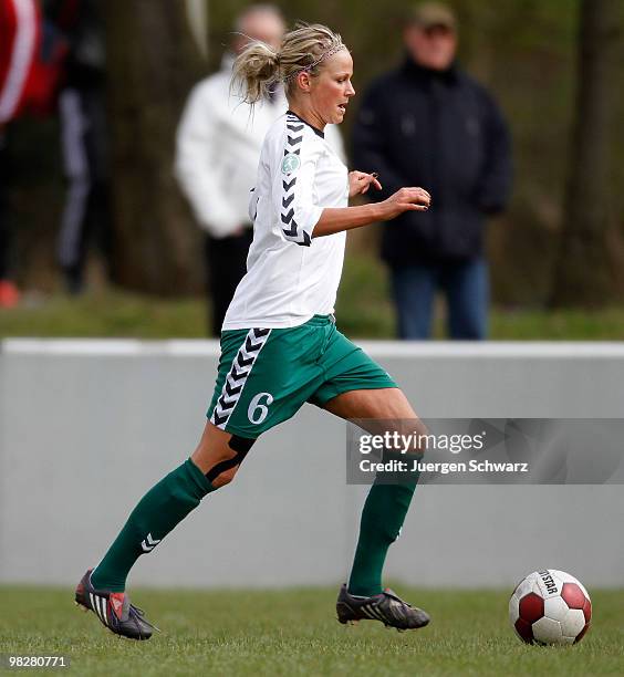 Ilka Pedersen of Duisburg kicks the ball during the Women's Second Bundesliga match between FCR 2001 Duisburg II and Bayer 04 Leverkusen on April 5,...