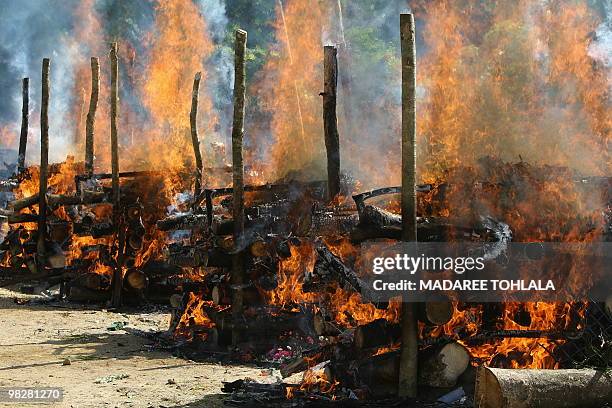 The six victims of the latest attacks by Muslim separatists are burnt during a cremation ceremony in Thailand's restive southern province of...