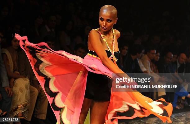 Model showcases a creation by Indian designer Suneet Varma during the grand finale on the last day of Lakme Fashion Week Summer/Resort 2010 in Mumbai...