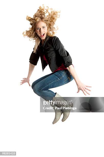 girl jumping - paul piebinga stock pictures, royalty-free photos & images