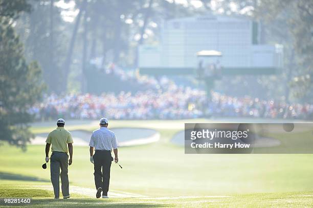 Tiger Woods and Mark O'Meara walk together during a practice round prior to the 2010 Masters Tournament at Augusta National Golf Club on April 6,...