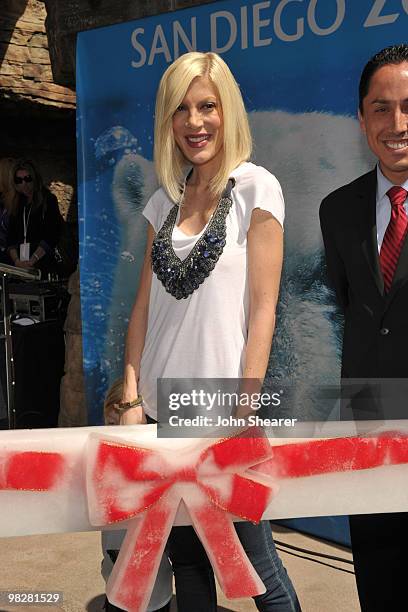 Actress Tori Spelling poses before the ribbon cutting at the launch of the Polar Bear Plunge at the World Famous San Diego Zoo on March 26, 2010 in...
