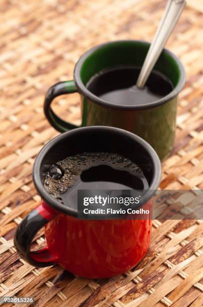 enamel coffee cups - flavio coelho stock pictures, royalty-free photos & images