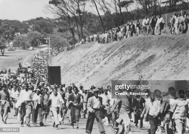 Protestors march from Langa into Cape Town in South Africa, to demand the release of prisoners from the police station in Caledon Square, 30th March...