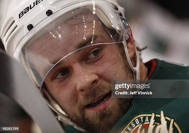 Guillaume Latendresse of the Minnesota Wild looks on from the bench during their game against the Vancouver Canucks at General Motors Place on April...