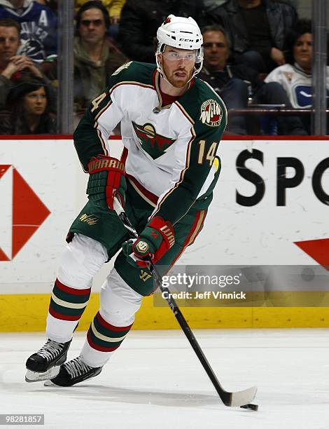 Martin Havlat of the Minnesota Wild skates up ice with the puck during their game against the Vancouver Canucks at General Motors Place on April 4,...