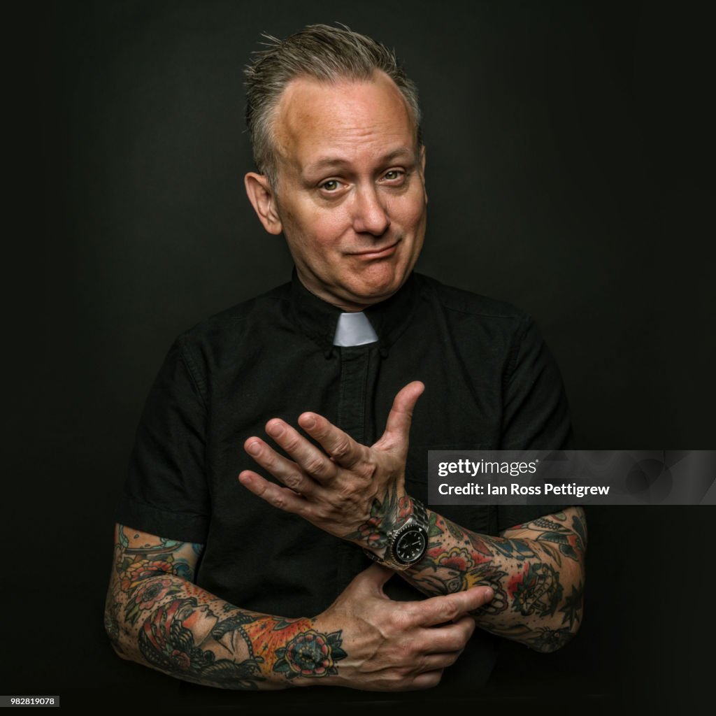 Portrait of tattooed priest