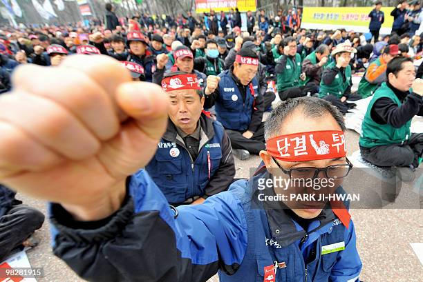 SKorea-economy-labour by Jun Kwanwoo Labour union members from the Korean Confederation of Trade Unions shout slogans during a rally against the...