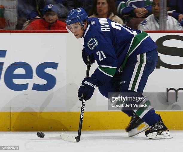 Mason Raymond of the Vancouver Canucks skates up ice with the puck during their game against the Minnesota Wild at General Motors Place on April 4,...